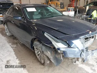 2015 Cadillac CTS AWD z VIN 1G6AW5SXXF0136481, wystawiony jako IAAI lot #42173024 z przebiegiem 128 984 mil mil oraz . Historia ofert i sprzedaży dostępna na DreamBid. Obrazek 12.