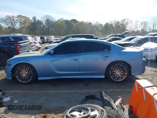 2019 Dodge Charger Scat Pack with VIN 2C3CDXGJ0KH613053, listed as a IAAI auction lot 41908658 with 85,000 mi miles and . Bid and sale history available at DreamBid. Image 14.