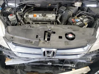 2011 Honda CR-V EX-L z VIN JHLRE4H74BC013467, wystawiony jako Copart lot #56919305 z przebiegiem 166 617 mil mil oraz Szkoda całkowita • Salvage title. Historia ofert i sprzedaży dostępna na DreamBid. Obrazek 12.