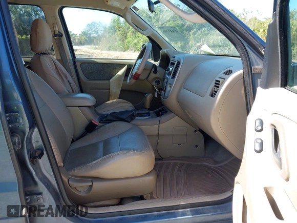 2006 Ford Escape XLT with VIN 1FMYU031X6KB00529, listed as a IAAI auction lot 42142206 with 125,462 mi miles and . Bid and sale history available at DreamBid. Image 5.