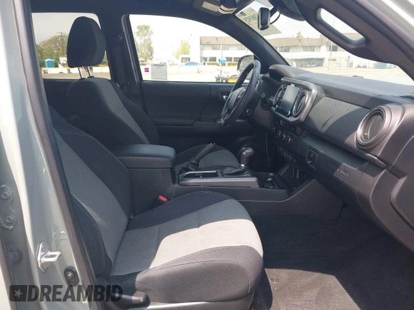 2022 Toyota Tacoma SR5 with VIN 3TMBZ5DN1NM035572, listed as a IAAI auction lot 42083925 with 82,596 mi miles and . Bid and sale history available at DreamBid. Image 5.