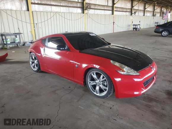 2012 Nissan 370Z Touring with VIN JN1AZ4EH7CM561747, listed as a Copart auction lot 53944175 with 152,128 mi miles and Salvage Title. Bid and sale history available at carsss.com. Image 4.