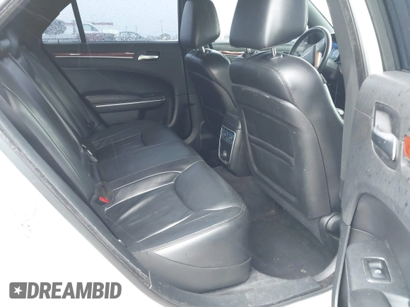 2014 Chrysler 300 with VIN 2C3CCAAG2EH235495, listed as a IAAI auction lot 41787801 with 142,354 mi miles and . Bid and sale history available at DreamBid. Image 8.