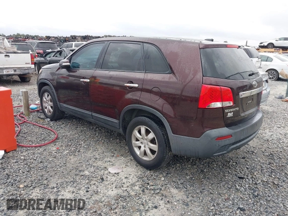 2011 Kia Sorento LX with VIN 5XYKT3A14BG083826, listed as a IAAI auction lot 41549754 with 216,831 mi miles. Bid and sale history available at carsss.com. Image 3.