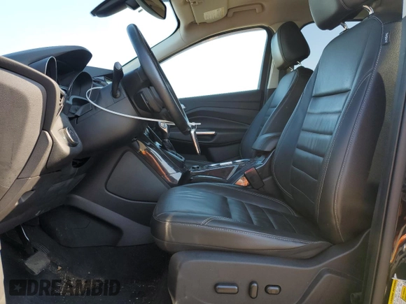 2015 Ford Escape Titanium with VIN 1FMCU0J95FUB59026, listed as a Copart auction lot 65047545 with 84,259 mi miles and Salvage title. Bid and sale history available at DreamBid. Image 7.