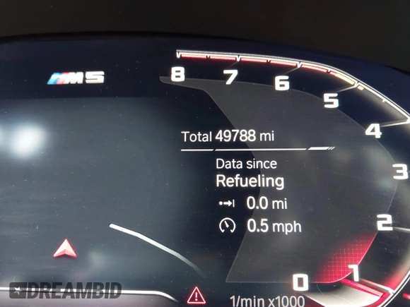 2020 BMW M5 Competition z VIN WBSJF0C00LCD37331, wystawiony jako IAAI lot #41738410 z przebiegiem 49 788 mil mil oraz . Historia ofert i sprzedaży dostępna na DreamBid. Obrazek 7.