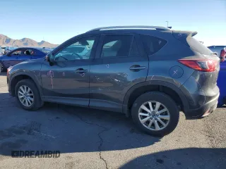 2016 Mazda CX-5 Touring with VIN JM3KE2CYXG0906293, listed as a Copart auction lot 46484185 with 89,544 mi miles and Salvage Title. Bid and sale history available at carsss.com. Image 2.