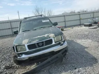 2000 Nissan Frontier XE with VIN 1N6ED27Y4YC382199, listed as a Copart auction lot 47127045 with 207,449 mi miles and Salvage title. Bid and sale history available at DreamBid. Image 11.