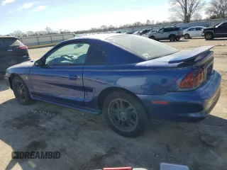 1997 Ford Mustang with VIN 1FALP404XVF156625, listed as a Copart auction lot 43497705 with 194,551 mi miles and Salvage Title. Bid and sale history available at carsss.com. Image 2.