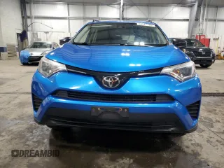 2017 Toyota RAV4 LE with VIN JTMBFREV8HJ141257, listed as a Copart auction lot 54527785 with 125,423 mi miles and Salvage Title. Bid and sale history available at DreamBid. Image 5.
