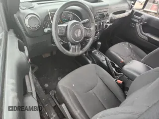 2016 Jeep Wrangler Willys Wheeler with VIN 1C4GJWAG6GL326498, listed as a Copart auction lot 62849715 with 49,414 mi miles and Salvage title. Bid and sale history available at DreamBid. Image 8.