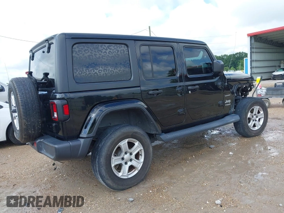 2019 Jeep Wrangler Unlimited Sahara with VIN 1C4HJXEN9KW514880, listed as a IAAI auction lot 42319437 with 70,186 mi miles and . Bid and sale history available at DreamBid. Image 4.