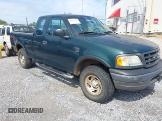 2003 Ford F-150 XL z VIN 1FTRX18L13NB27919, wystawiony jako IAAI lot #42313184 z przebiegiem 113 846 mil mil oraz . Historia ofert i sprzedaży dostępna na DreamBid. Obrazek 1.