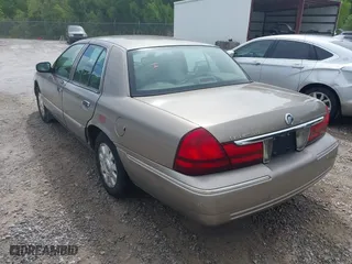 2005 Mercury Grand Marquis LS Premium with VIN 2MEFM75W35X654244, listed as a IAAI auction lot 42090783 with 120,033 mi miles. Bid and sale history available at carsss.com. Image 6.