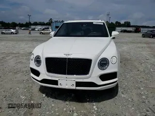 2019 Bentley Bentayga V8 z VIN SJAAM2ZV0KC026362, wystawiony jako Copart lot #54059393 z przebiegiem 31 530 mil mil oraz . Historia ofert i sprzedaży dostępna na DreamBid. Obrazek 11.