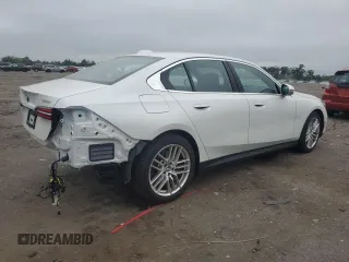 2024 BMW 5 Series 540i xDrive with VIN WBA63FJ01RCR67129, listed as a Copart auction lot 62095995 with 5,075 mi miles and Salvage title. Bid and sale history available at DreamBid. Image 3.
