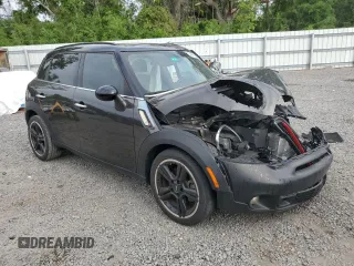 2015 MINI Countryman S with VIN WMWZC3C57FWP52868, listed as a Copart auction lot 54909085 with 68,003 mi miles and Salvage title. Bid and sale history available at DreamBid. Image 4.