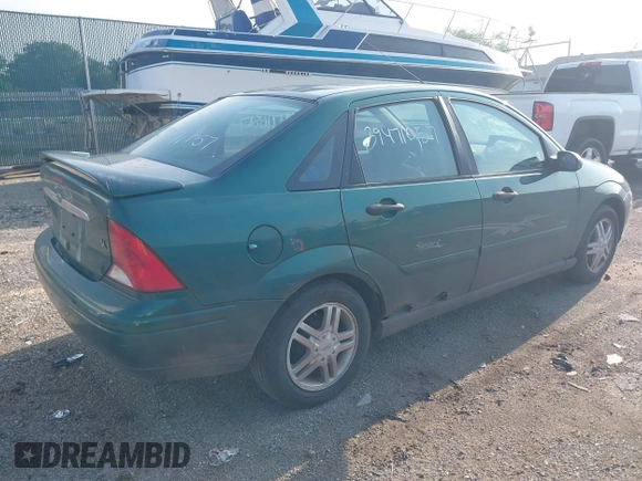 2000 Ford Focus SE with VIN 1FAFP3431YW273376, listed as a IAAI auction lot 39471057 with 214,968 mi miles and . Bid and sale history available at carsss.com. Image 4.