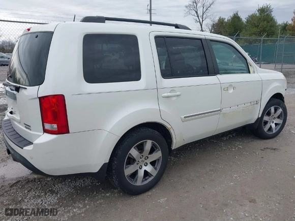 2015 Honda Pilot Touring with VIN 5FNYF4H92FB054485, listed as a IAAI auction lot 41736909 with 159,813 mi miles. Bid and sale history available at carsss.com. Image 4.