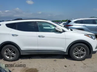 2018 Hyundai Santa Fe 2.4L z VIN 5NMZUDLB3JH055771, wystawiony jako IAAI lot #42126058 z przebiegiem 142 991 mil mil oraz . Historia ofert i sprzedaży dostępna na DreamBid. Obrazek 13.