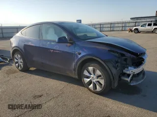 2023 Tesla Model Y Long Range with VIN 7SAYGDEE7PA146322, listed as a Copart auction lot 54071165 with 38,334 mi miles and Salvage Title. Bid and sale history available at DreamBid. Image 4.