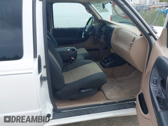 2003 Ford Ranger XL Fleet z VIN 1FTYR44V23TA10053, wystawiony jako IAAI lot #42504530 z przebiegiem 152 733 mil mil oraz . Historia ofert i sprzedaży dostępna na DreamBid. Obrazek 5.
