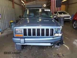 1998 Jeep Cherokee Country with VIN 1J4FT78S8WL252502, listed as a Copart auction lot 59664545 with 133,148 mi miles and Salvage title. Bid and sale history available at DreamBid. Image 5.