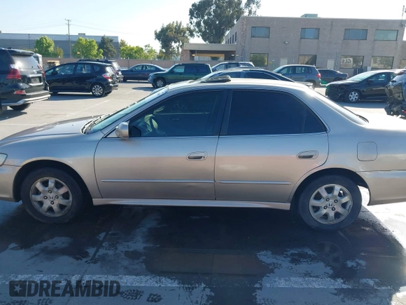 2001 Honda Accord EX z VIN JHMCG66801C010759, wystawiony jako IAAI lot #42303890 z przebiegiem 216 143 mil mil oraz . Historia ofert i sprzedaży dostępna na DreamBid. Obrazek 14.