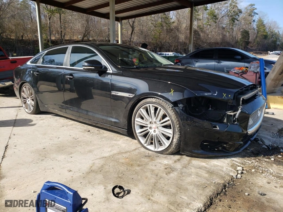 2015 Jaguar XJ with VIN SAJWA2GZ1F8V85688, listed as a Copart auction lot 43112915 with 0 mi miles and Salvage Title. Bid and sale history available at carsss.com. Image 4.