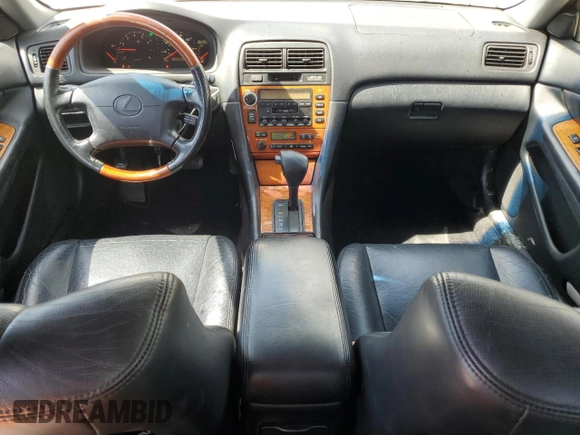 2000 Lexus ES 300 with VIN JT8BF28G9Y5100812, listed as a Copart auction lot 56790365 with 161,518 mi miles and Salvage title. Bid and sale history available at DreamBid. Image 8.