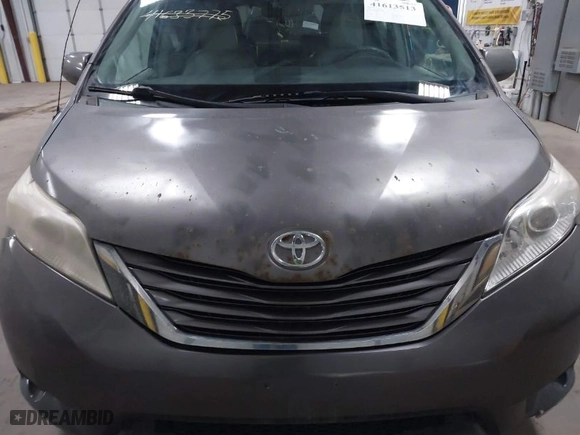 2012 Toyota Sienna XLE AAS with VIN 5TDYK3DC9CS268758, listed as a IAAI auction lot 41613513 with 214,601 mi miles. Bid and sale history available at carsss.com. Image 12.