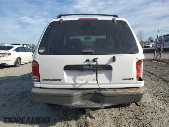 1999 Ford Explorer Sport with VIN 1FMYU24X7XUC50909, listed as a Copart auction lot 50254305 with 83,605 mi miles and Salvage title. Bid and sale history available at DreamBid. Image 6.