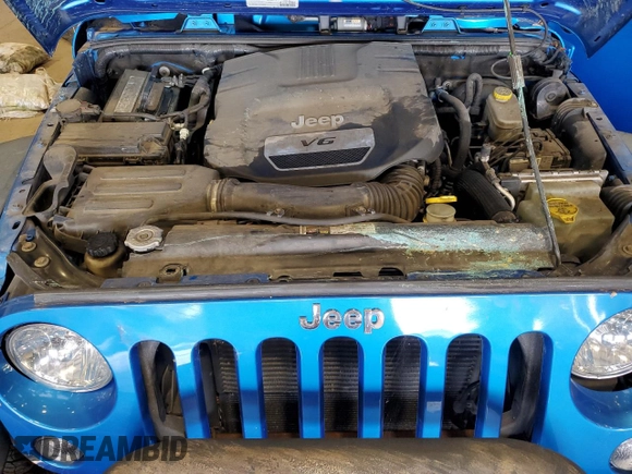 2015 Jeep Wrangler Freedom Edition z VIN 1C4AJWAG7FL520090, wystawiony jako Copart lot #62756975 z przebiegiem Nie podano mil oraz Szkoda całkowita • Salvage title. Historia ofert i sprzedaży dostępna na DreamBid. Obrazek 11.