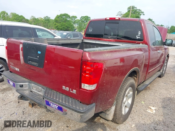 2004 Nissan Titan SE with VIN 1N6AA06A94N545539, listed as a IAAI auction lot 42036468 with 212,269 mi miles. Bid and sale history available at carsss.com. Image 4.