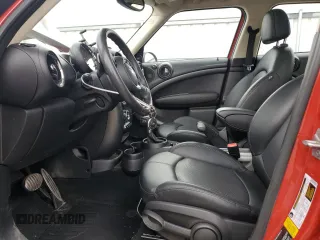 2016 MINI Countryman S with VIN WMWZC5C51GWU01015, listed as a Copart auction lot 51223155 with 74,602 mi miles and Salvage Title. Bid and sale history available at DreamBid. Image 7.