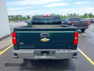 2014 Chevrolet Silverado 1500 LT with VIN 1GCRCREH2EZ323115, listed as a IAAI auction lot 42055949 with 61,337 mi miles and . Bid and sale history available at DreamBid. Image 16.