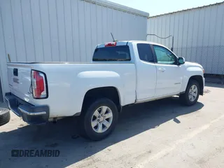 2015 GMC Canyon 2WD SLE z VIN 1GTH5BEA4F1239815, wystawiony jako IAAI lot #42135355 z przebiegiem 110 696 mil mil oraz . Historia ofert i sprzedaży dostępna na DreamBid. Obrazek 4.