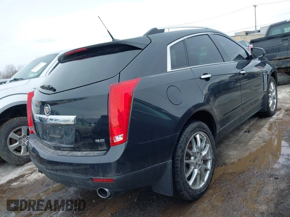 2013 Cadillac SRX Performance Collection with VIN 3GYFNHE33DS527519, listed as a IAAI auction lot 41652822 with 201,580 mi miles. Bid and sale history available at carsss.com. Image 4.