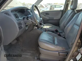 2002 Chevrolet Tracker ZR2 with VIN 2CNBJ734X26948098, listed as a Copart auction lot 73135754 with 234,627 mi miles and Salvage title. Bid and sale history available at DreamBid. Image 7.