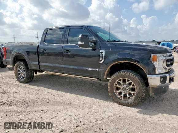 2021 Ford F-250 XL with VIN 1FT7W2BT6MEC47760, listed as a Copart auction lot 61908225 with 111,015 mi miles and Salvage title. Bid and sale history available at DreamBid. Image 4.