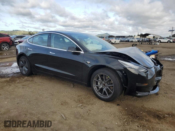 2019 Tesla Model 3 Mid Range with VIN 5YJ3E1EA3KF399335, listed as a Copart auction lot 49005185 with 38,270 mi miles and Salvage Title. Bid and sale history available at carsss.com. Image 4.