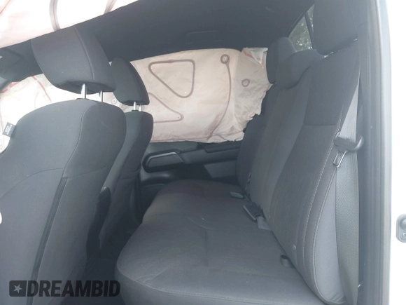 2019 Toyota Tacoma SR z VIN 3TMCZ5AN5KM249582, wystawiony jako IAAI lot #41925752 z przebiegiem 108 417 mil mil oraz . Historia ofert i sprzedaży dostępna na DreamBid. Obrazek 8.