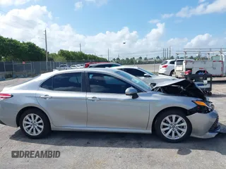 2019 Toyota Camry LE with VIN 4T1B11HK4KU249720, listed as a IAAI auction lot 41940728 with 35,891 mi miles and . Bid and sale history available at DreamBid. Image 13.