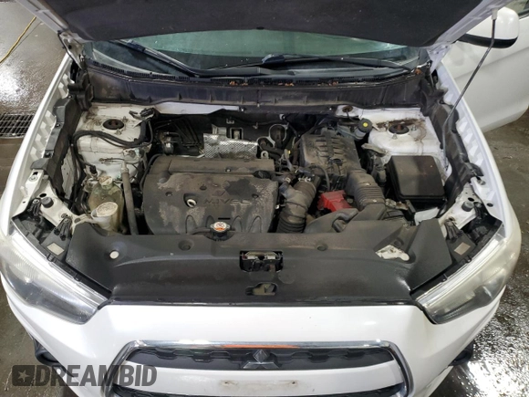 2014 Mitsubishi Outlander SE z VIN 4A4AR4AU6EE026656, wystawiony jako Copart lot #52806745 z przebiegiem 177 933 mil mil oraz Szkoda całkowita • Salvage title. Historia ofert i sprzedaży dostępna na DreamBid. Obrazek 13.