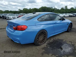 2015 BMW M4 with VIN WBS3R9C57FK332148, listed as a Copart auction lot 64934594 with 72,669 mi miles and Salvage Title. Bid and sale history available at carsss.com. Image 3.