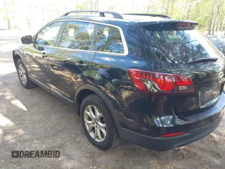2014 Mazda CX-9 Touring with VIN JM3TB3CV1E0428688, listed as a IAAI auction lot 42052151 with 208,050 mi miles and . Bid and sale history available at DreamBid. Image 3.