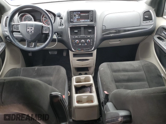 2015 Dodge Grand Caravan SE with VIN 2C4RDGBG3FR636473, listed as a Copart auction lot 53513275 with 128,994 mi miles and Salvage Title. Bid and sale history available at DreamBid. Image 8.