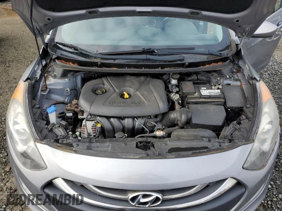 2013 Hyundai Elantra z VIN KMHD35LE3DU075234, wystawiony jako Copart lot #57754185 z przebiegiem 107 040 mil mil oraz Szkoda całkowita • Salvage title. Historia ofert i sprzedaży dostępna na DreamBid. Obrazek 12.