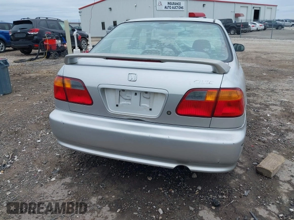 2000 Honda Civic VP z VIN 2HGEJ6613YH575630, wystawiony jako IAAI lot #41525214 z przebiegiem 251 481 mil mil oraz . Historia ofert i sprzedaży dostępna na DreamBid. Obrazek 16.