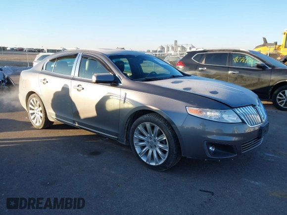 2012 Lincoln MKS with VIN 1LNHL9ER0CG801671, listed as a IAAI auction lot 41287565 with 137,903 mi miles. Bid and sale history available at carsss.com. Image 1.
